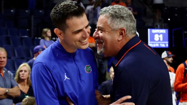 Florida head coach Todd Golden and Auburn head coach Bruce Pearl